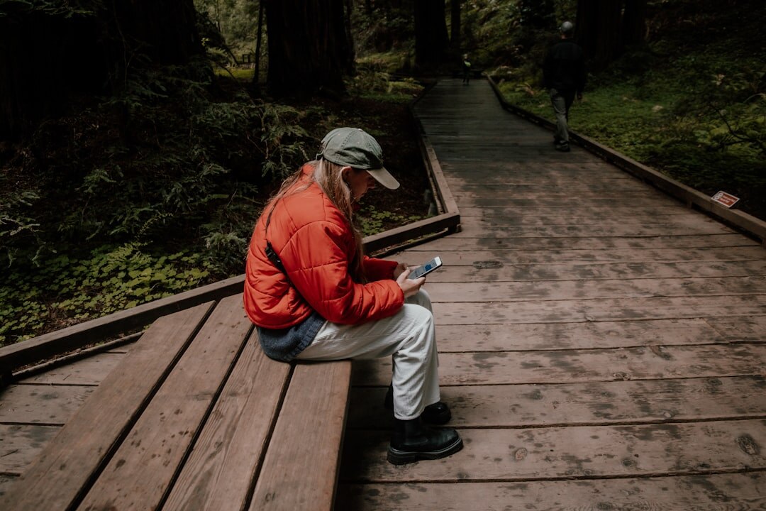 person journaling in park