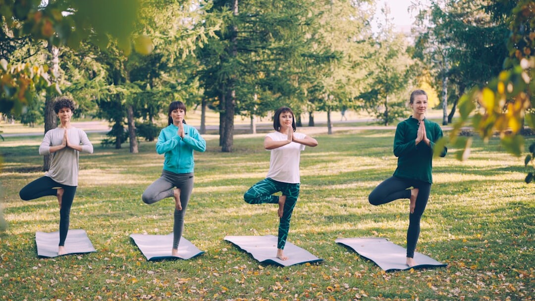 woman practicing yoga outdoors