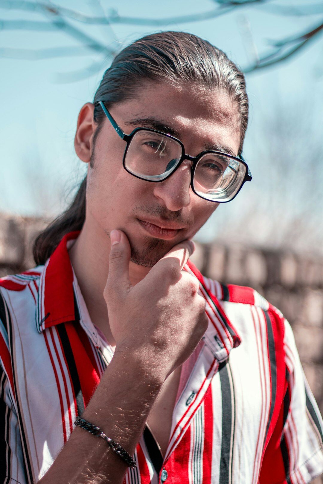 Close up portrait of a thoughtful young man
