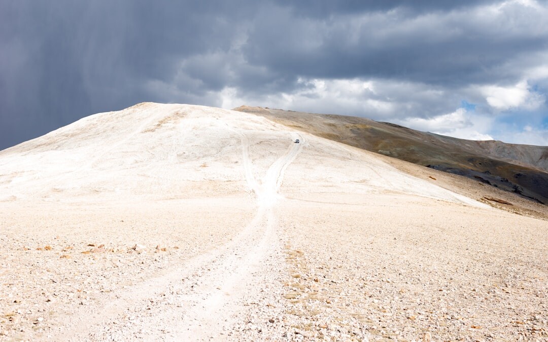 person hiking through storm